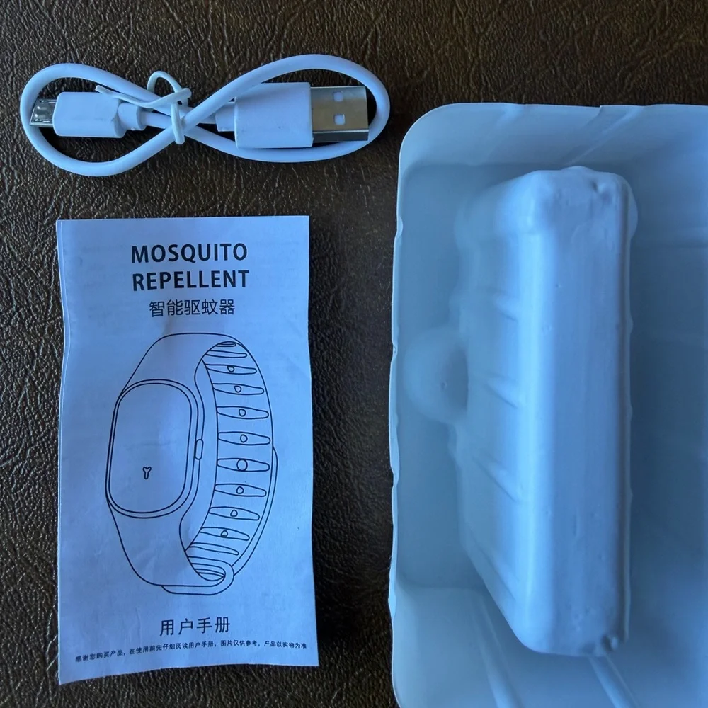 Ultrasonic Mosquito Repellent Bracelet Set of 2 Black and White, brand new
